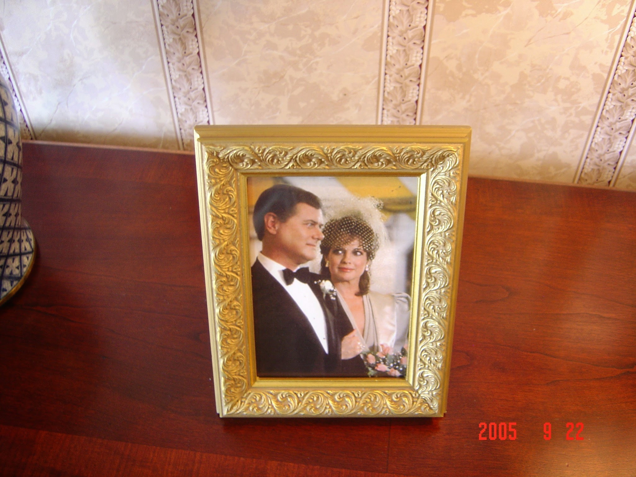 Framed Dallas cast portrait on display at Southfork Ranch, 22 September 2005